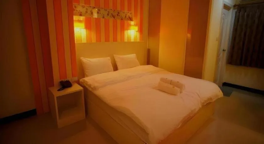 Bed in Ido Boutique Suite