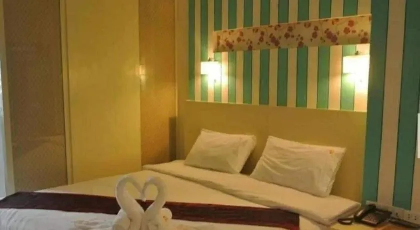 Bed in Ido Boutique Suite