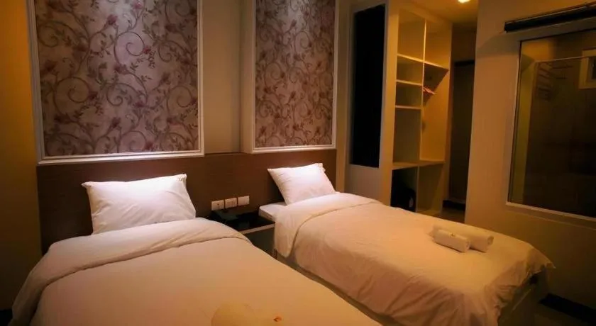 Bed in Ido Boutique Suite