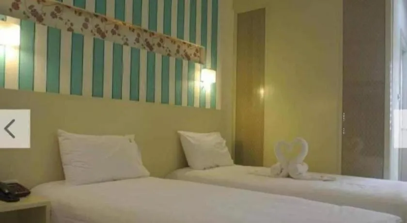 Bed in Ido Boutique Suite