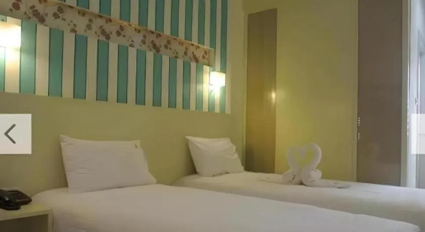 Bed in Ido Boutique Suite