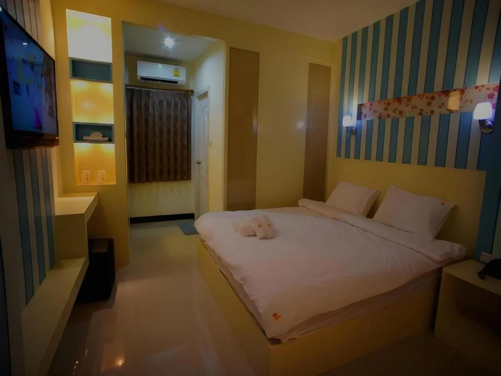 Bed in Ido Boutique Suite