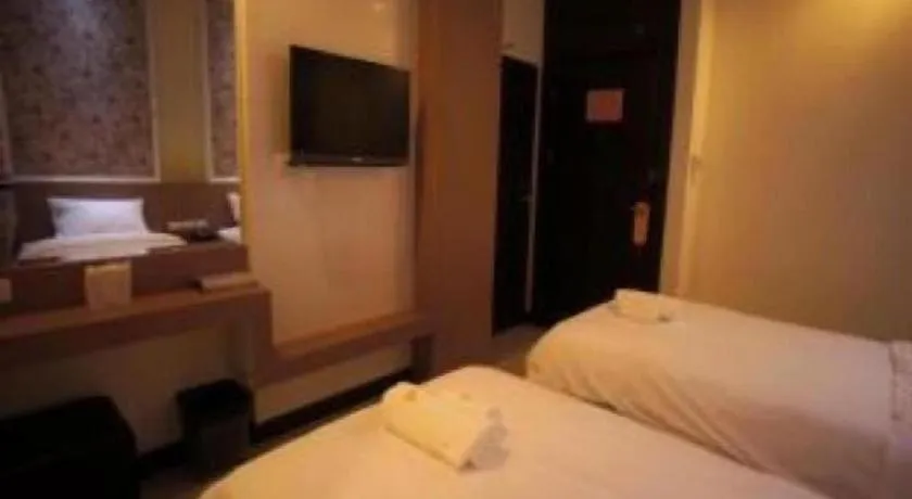 Bed in Ido Boutique Suite