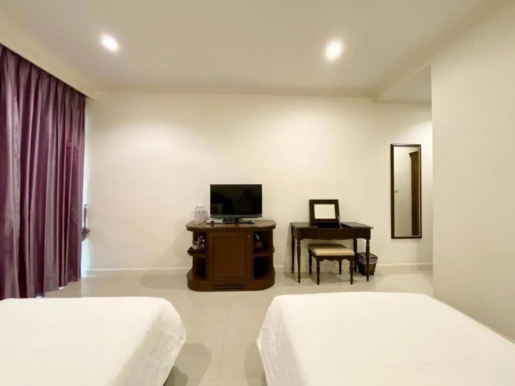 Bed in Ruen Maihom Riverside Cottage