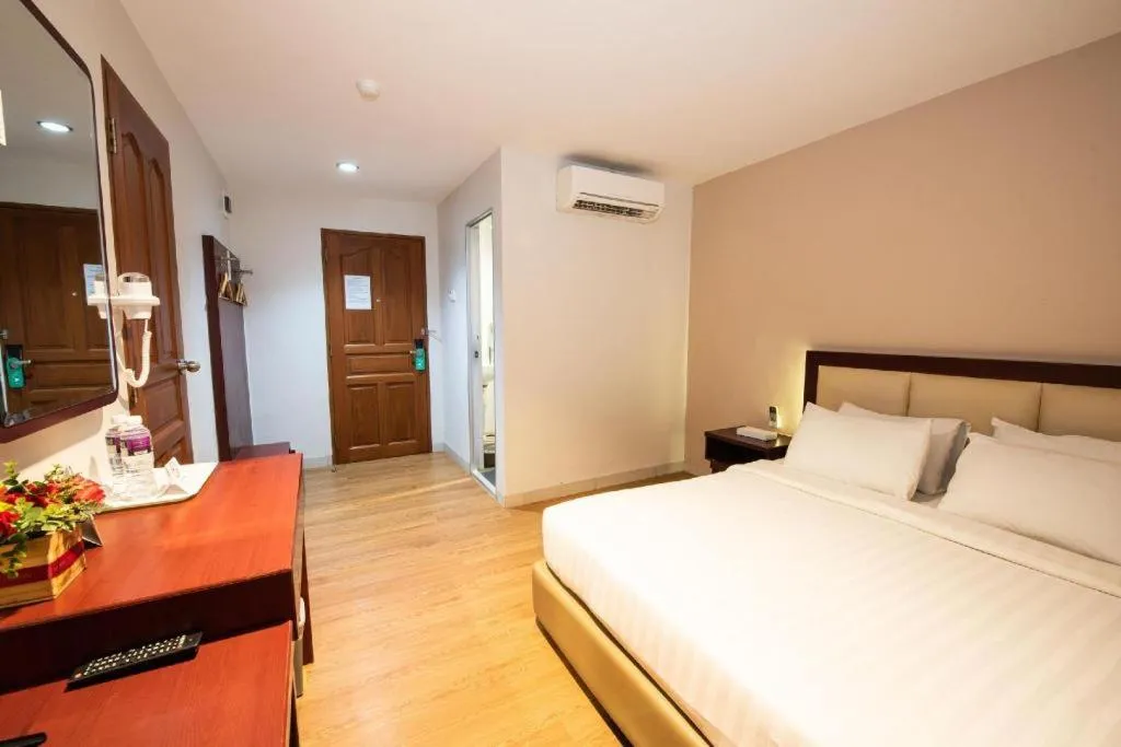 Bed in Lovina Inn Penuin Hotel