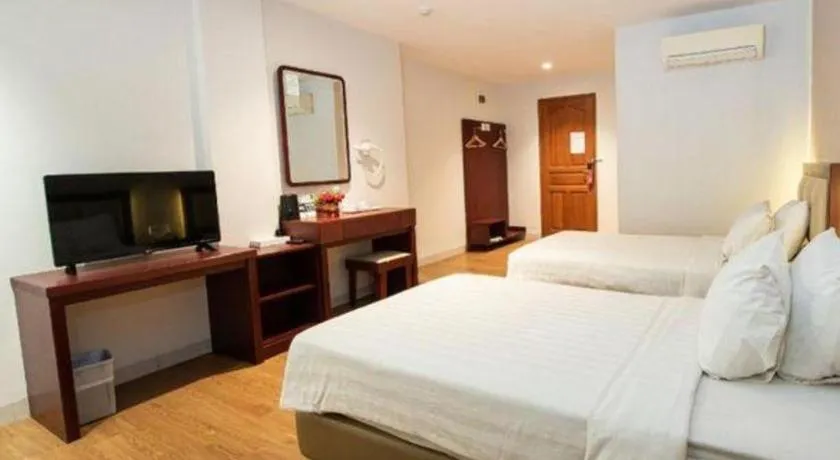 Bed in Lovina Inn Penuin Hotel