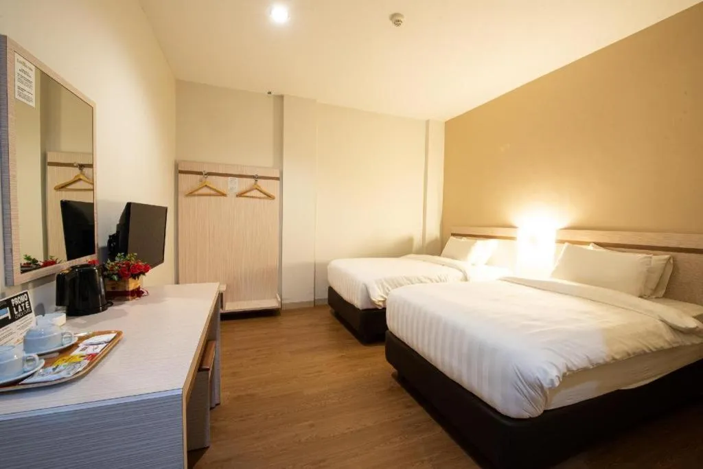 Bed in Lovina Inn Penuin Hotel