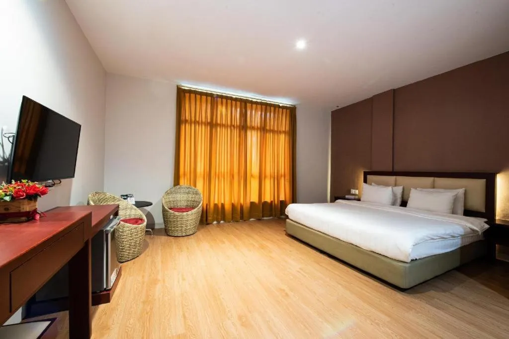 Bed in Lovina Inn Penuin Hotel