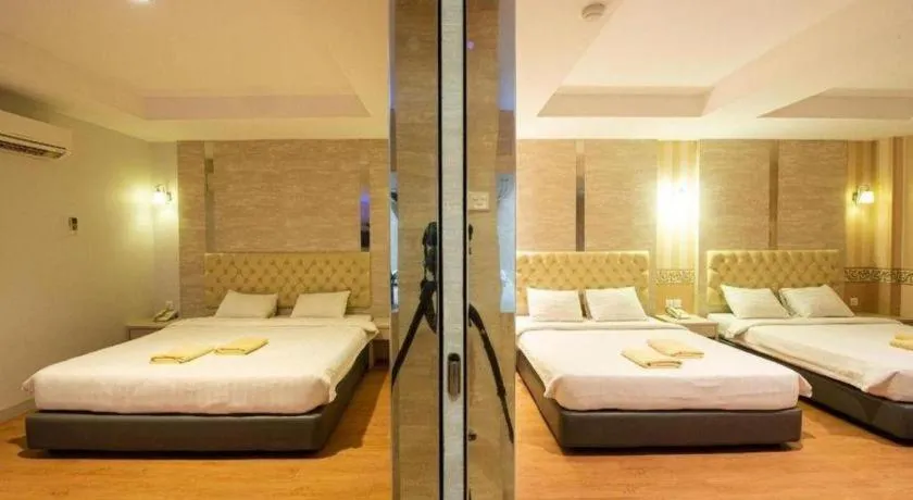 Bed in Lovina Inn Penuin Hotel