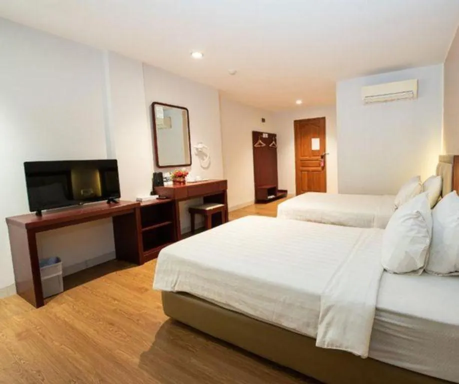 Bed in Lovina Inn Penuin Hotel