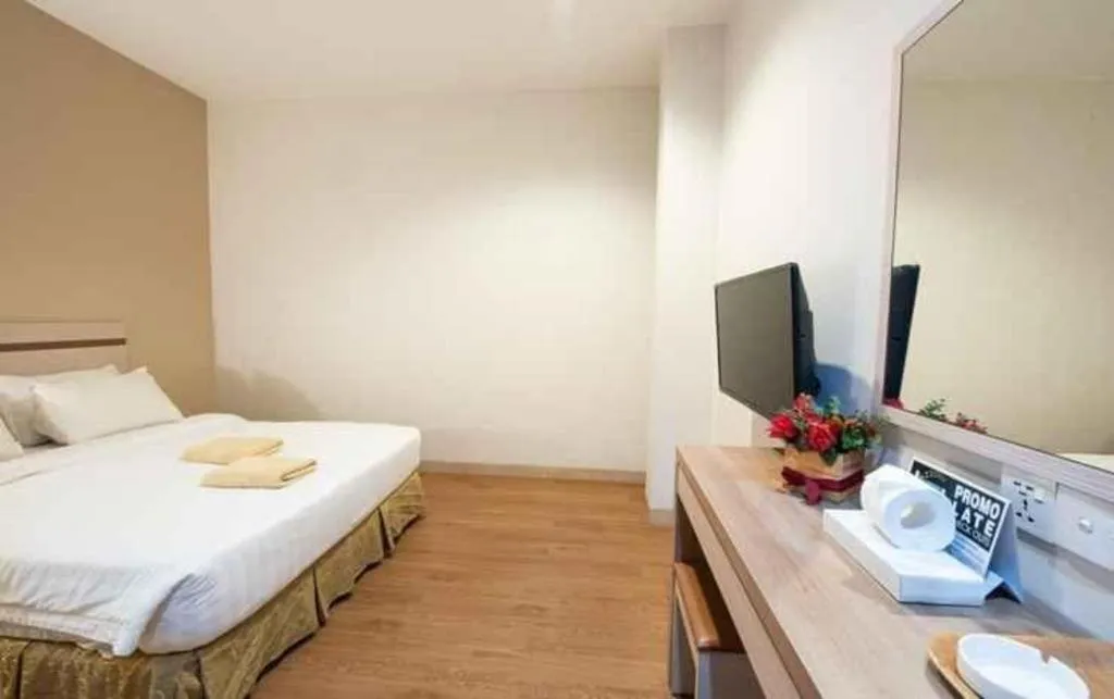 Bed in Lovina Inn Penuin Hotel