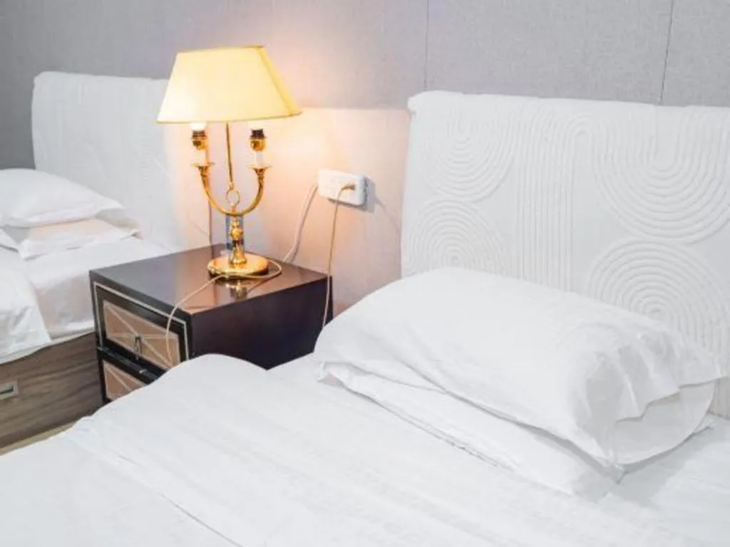 Bed in Qingdao Danube International Hotel