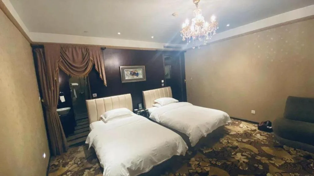 Bed in Qingdao Danube International Hotel