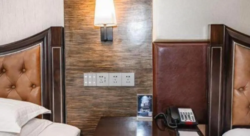 Bed in Qingdao Danube International Hotel