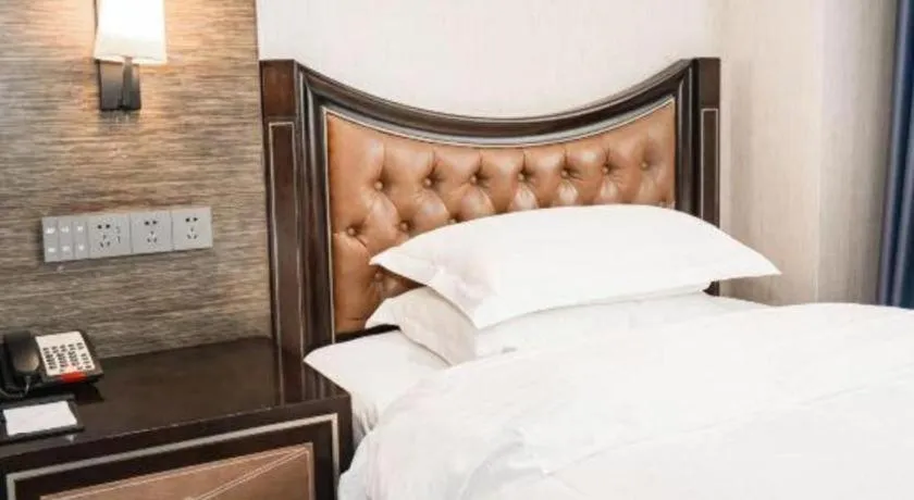 Bed in Qingdao Danube International Hotel