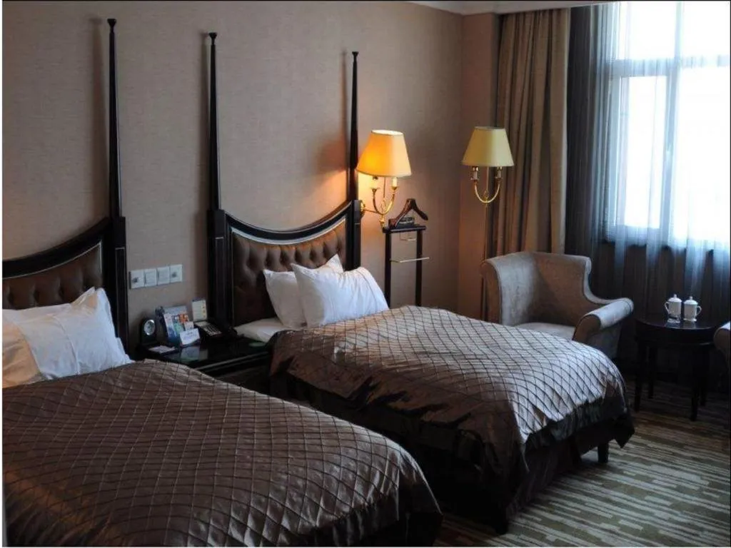 Bed in Qingdao Danube International Hotel