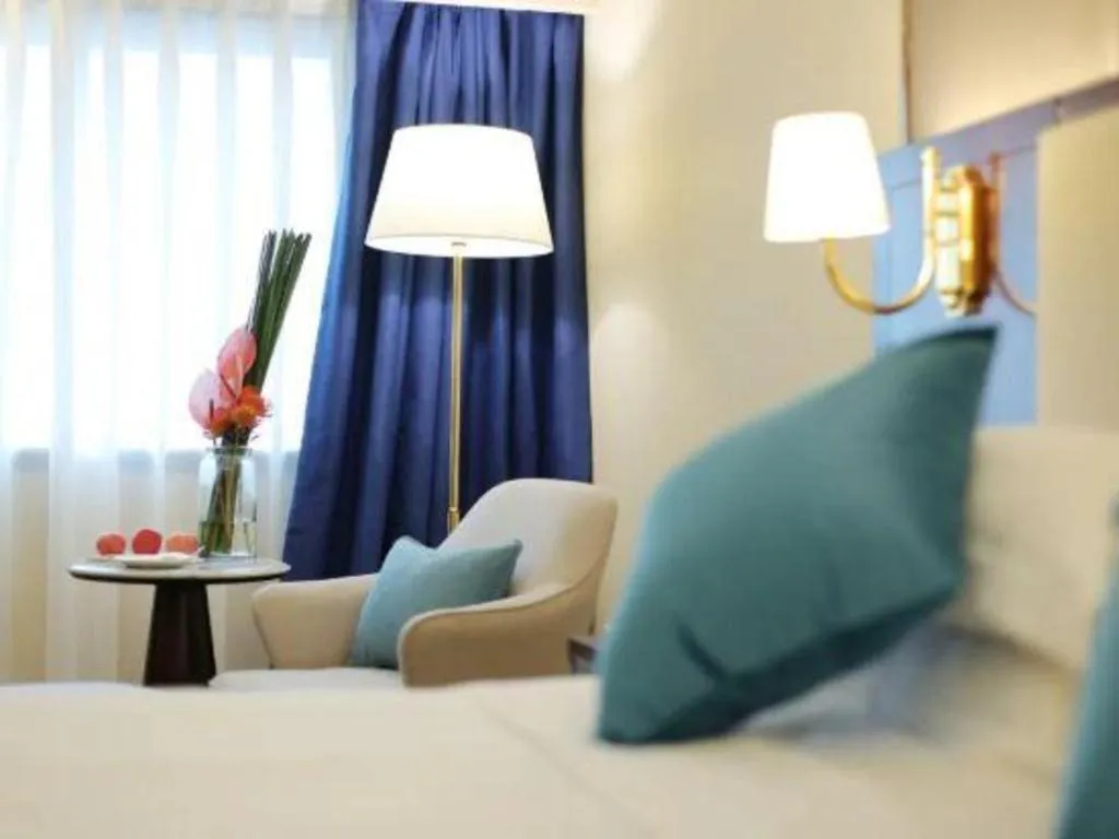 Bed in Qingdao Danube International Hotel