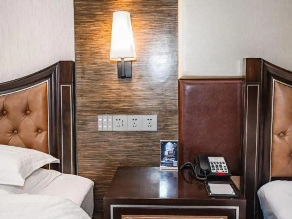 Bed in Qingdao Danube International Hotel