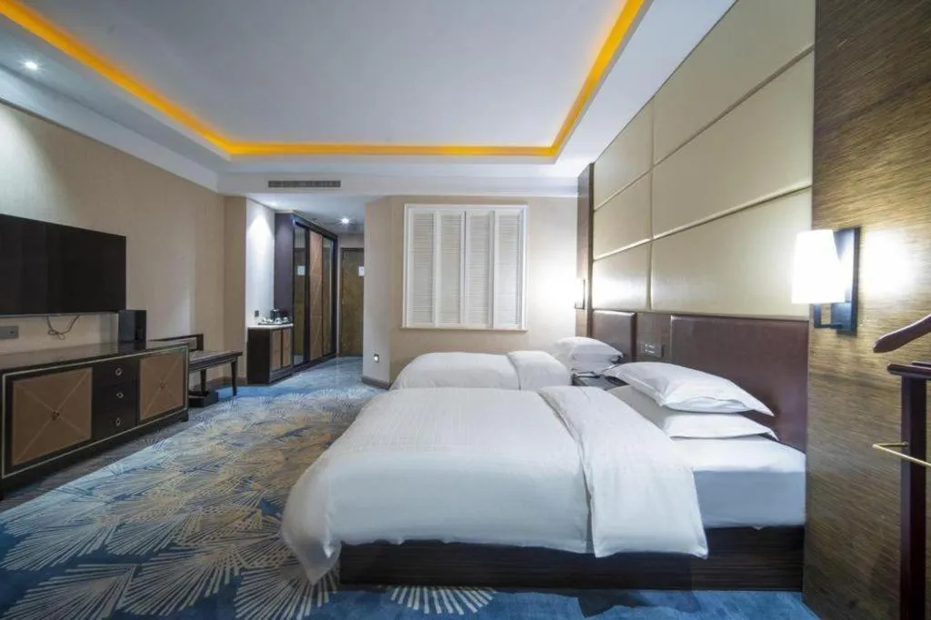 Bed in Qingdao Danube International Hotel