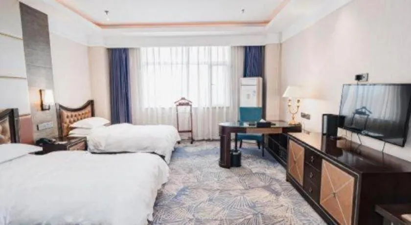 Bed in Qingdao Danube International Hotel