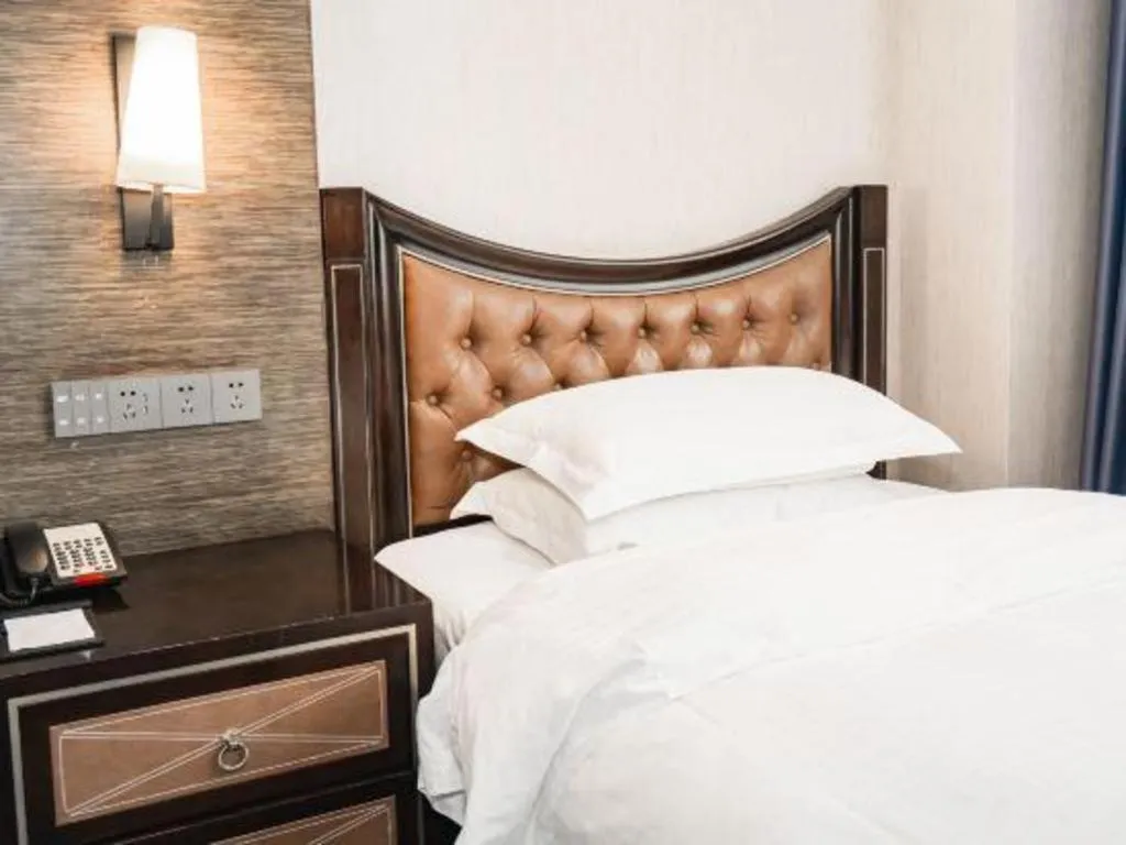 Bed in Qingdao Danube International Hotel