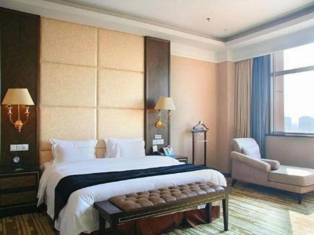 Bed in Qingdao Danube International Hotel