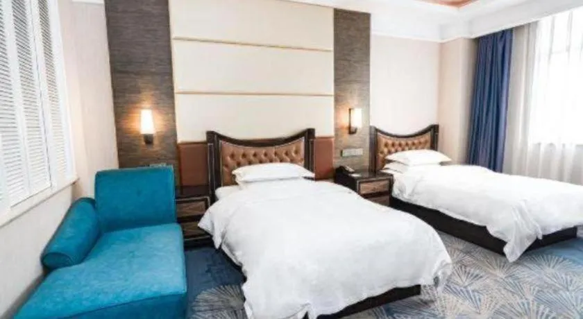 Bed in Qingdao Danube International Hotel