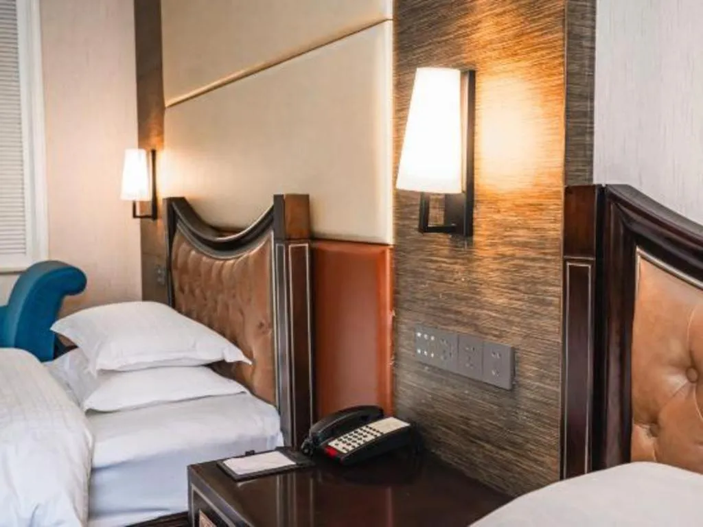 Bed in Qingdao Danube International Hotel