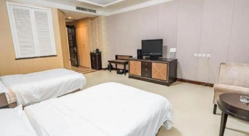 Bed in Qingdao Danube International Hotel