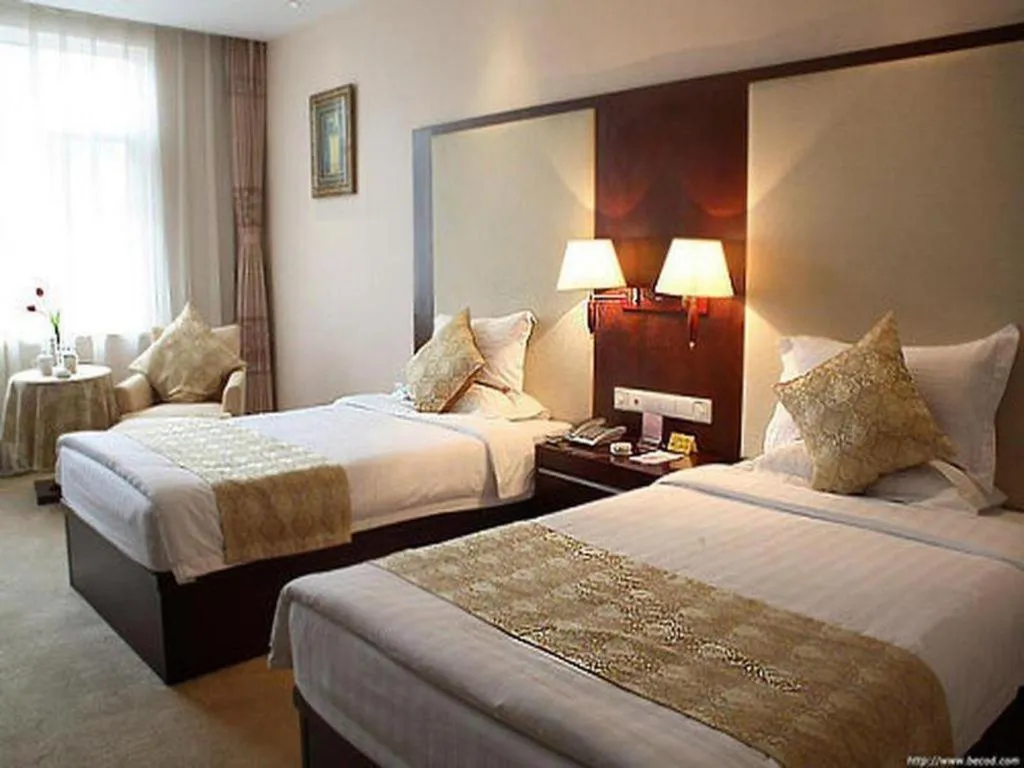 Bed in Qingdao Danube International Hotel