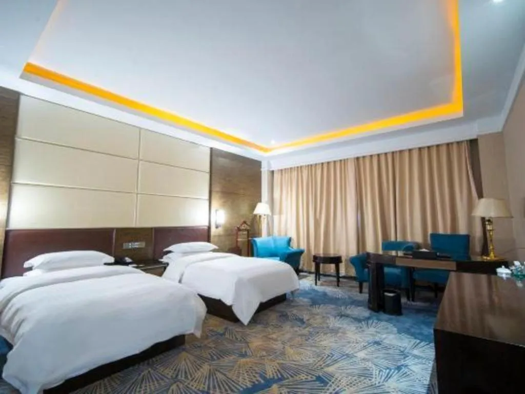 Bed in Qingdao Danube International Hotel