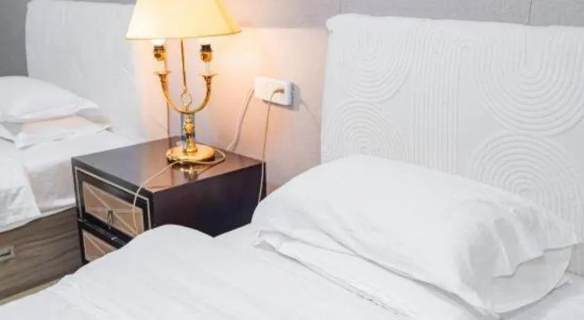 Bed in Qingdao Danube International Hotel