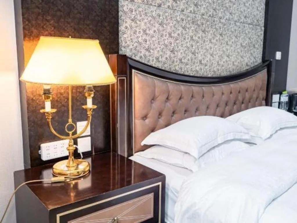 Bed in Qingdao Danube International Hotel