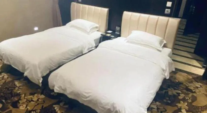 Bed in Qingdao Danube International Hotel