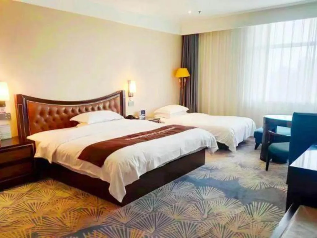 Bed in Qingdao Danube International Hotel