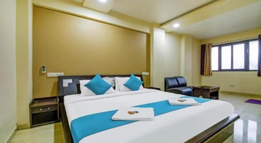 Bed in Hotel Rajdeep Inn