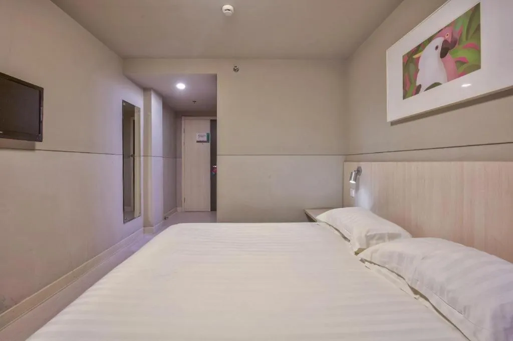Bed in Jinjiang Inn Taizhou Huangyan Jiufeng Park