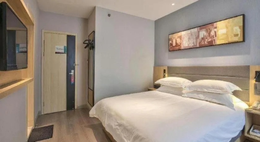 Bed in Jinjiang Inn Taizhou Huangyan Jiufeng Park