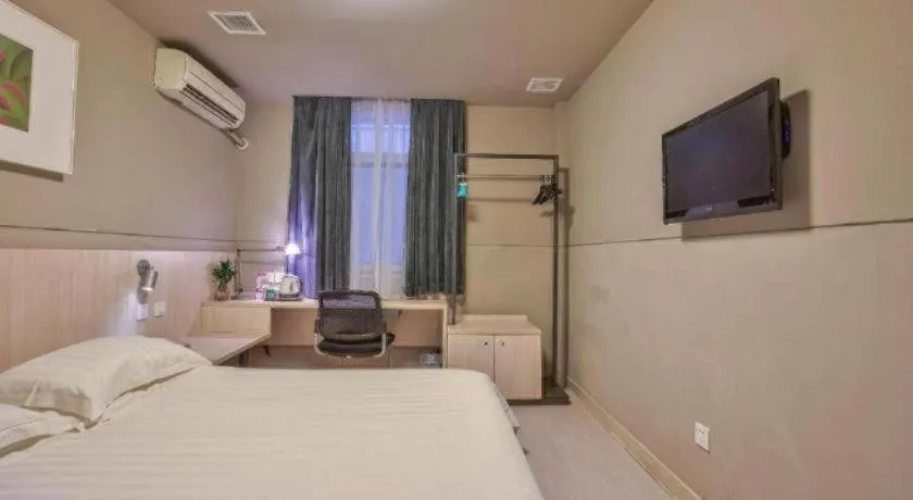 Bed in Jinjiang Inn Taizhou Huangyan Jiufeng Park