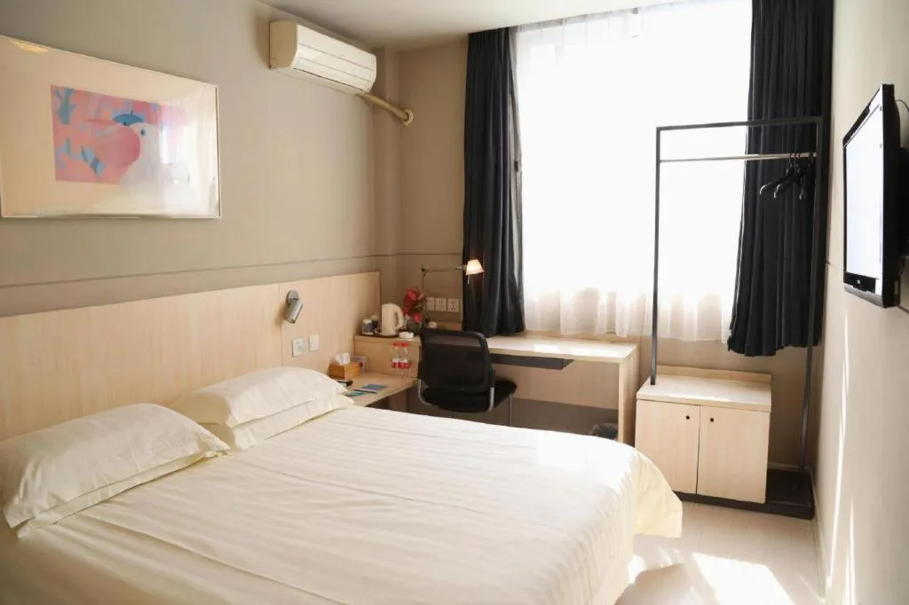 Bed in Jinjiang Inn Taizhou Huangyan Jiufeng Park