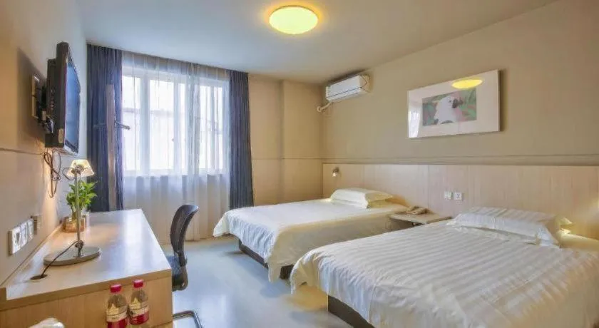 Bed in Jinjiang Inn Taizhou Huangyan Jiufeng Park