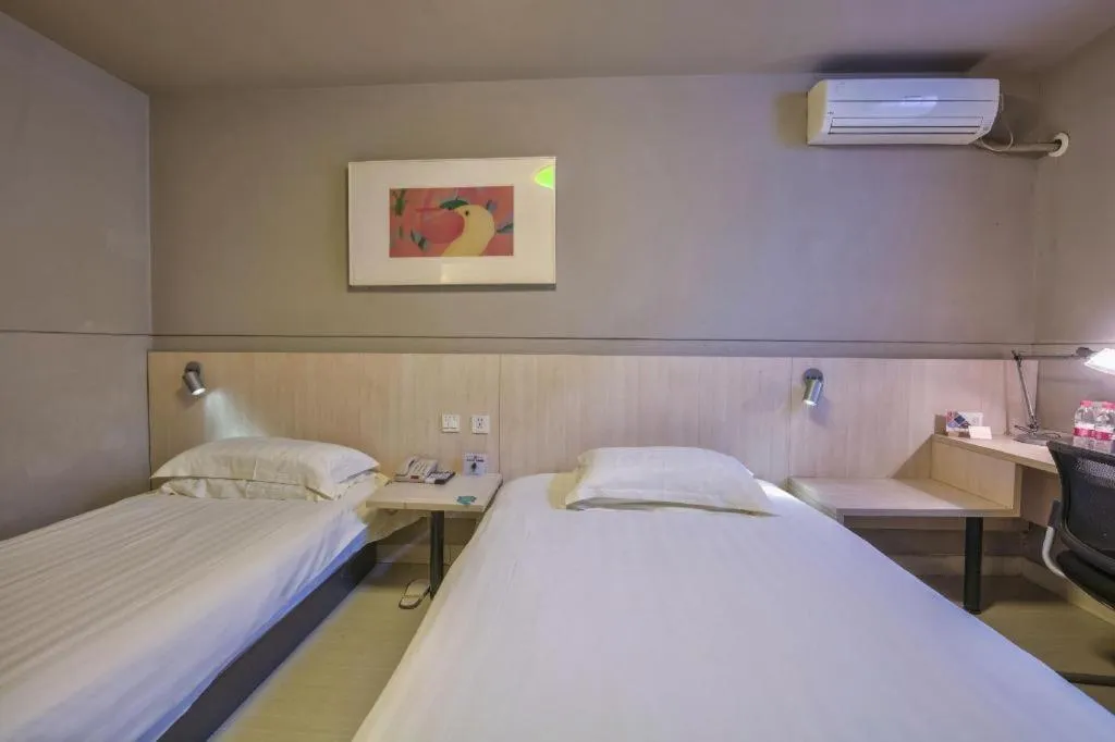 Bed in Jinjiang Inn Taizhou Huangyan Jiufeng Park