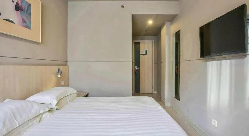 Bed in Jinjiang Inn Taizhou Huangyan Jiufeng Park