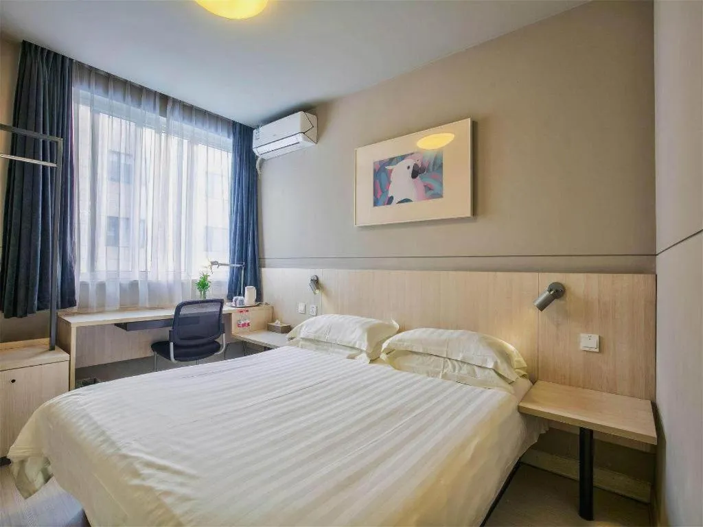 Bed in Jinjiang Inn Taizhou Huangyan Jiufeng Park