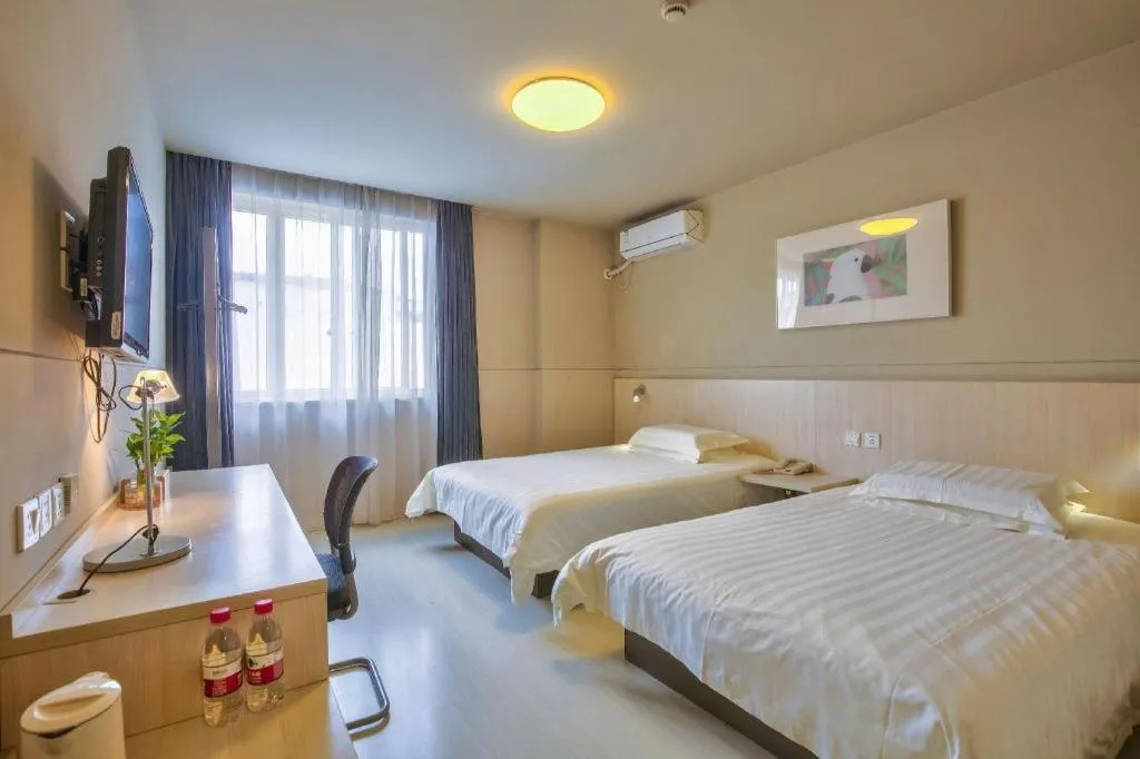 Bed in Jinjiang Inn Taizhou Huangyan Jiufeng Park
