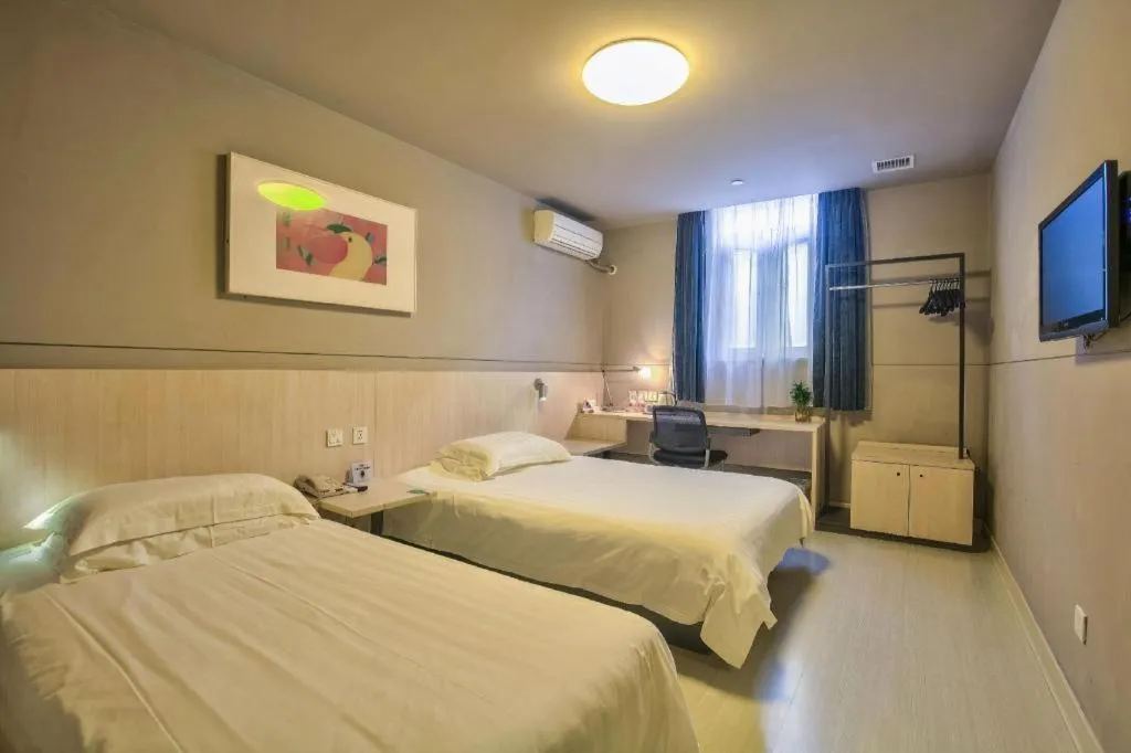 Bed in Jinjiang Inn Taizhou Huangyan Jiufeng Park