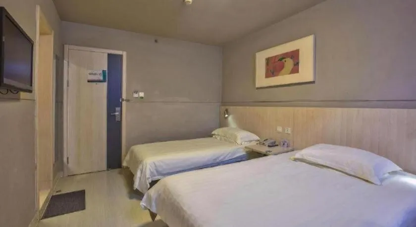 Bed in Jinjiang Inn Taizhou Huangyan Jiufeng Park