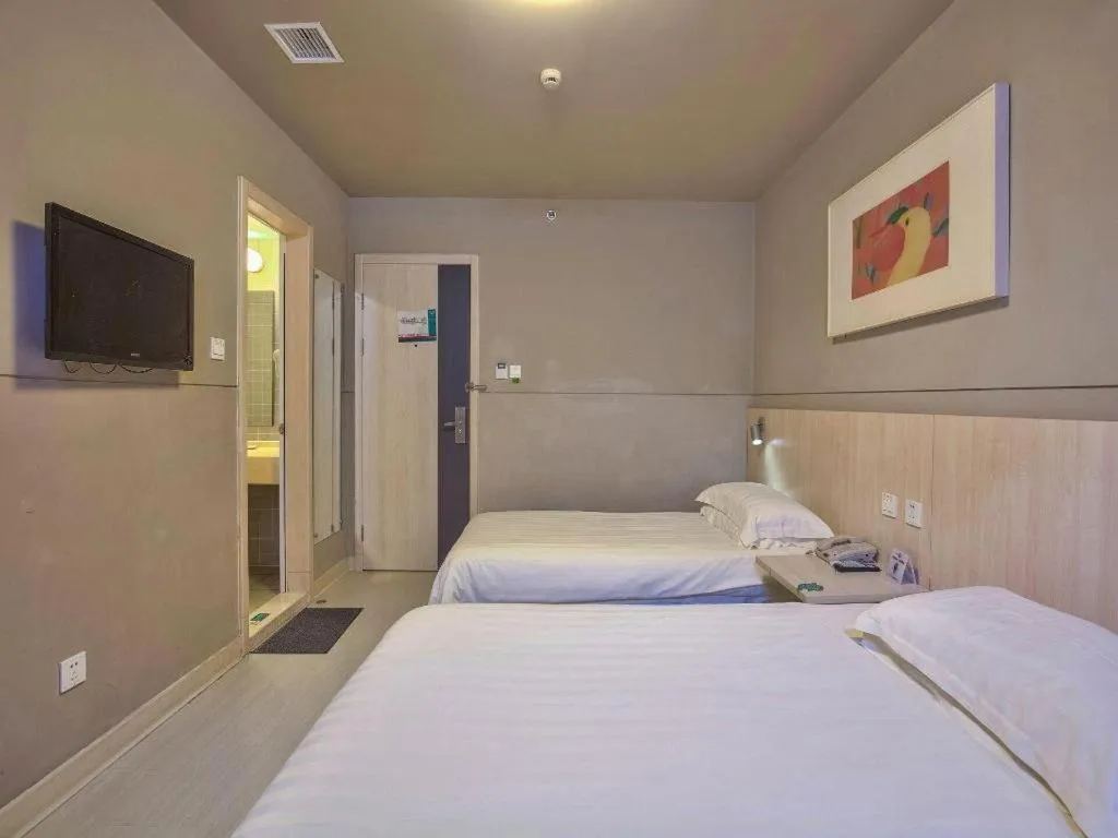 Bed in Jinjiang Inn Taizhou Huangyan Jiufeng Park