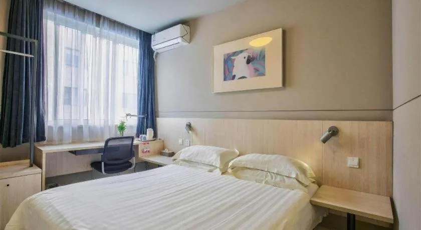 Bed in Jinjiang Inn Taizhou Huangyan Jiufeng Park