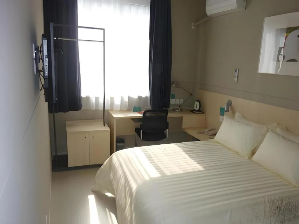 Bed in Jinjiang Inn Taizhou Huangyan Jiufeng Park